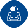 White outline of three people around a table in a blue rounded-square icon.