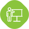 Green icon of a person presenting at a whiteboard or screen