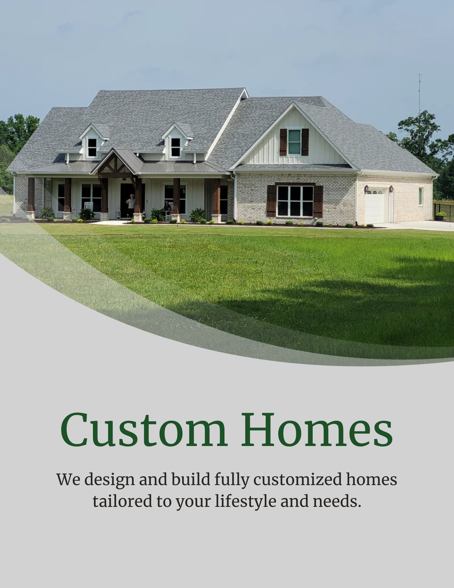 Custom home advertisement. Shows a large house with text, 