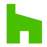 Green abstract shape resembling a house with a chimney, a door, and a slanted roof.