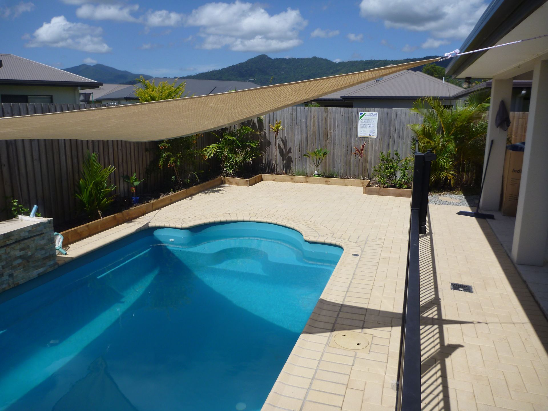 Concrete pavers installed to pool area