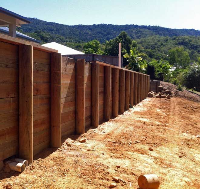 Timber retaining wall installed
