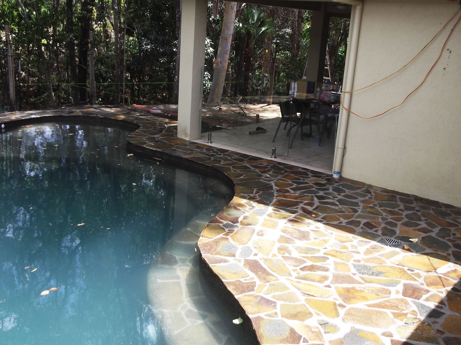 Crazy paving installed to pool area