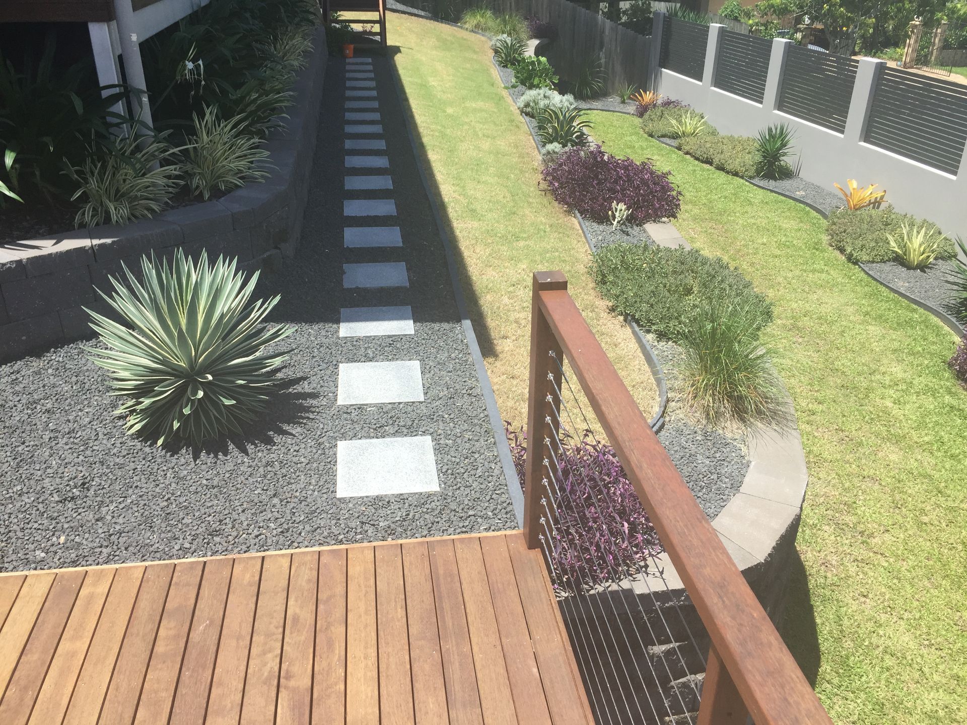 Feature stepping, edging, cushed rock and planting installed