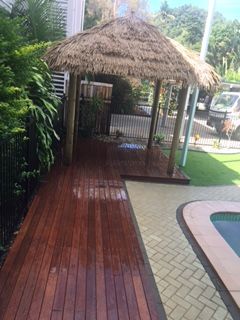 Decking and a thatched gazebo installed to resort pool area