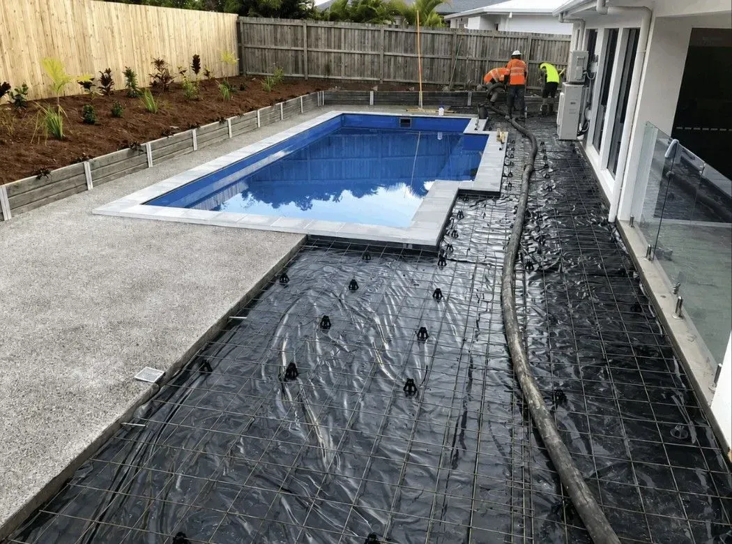 Concrete pool surround installation in Cairns