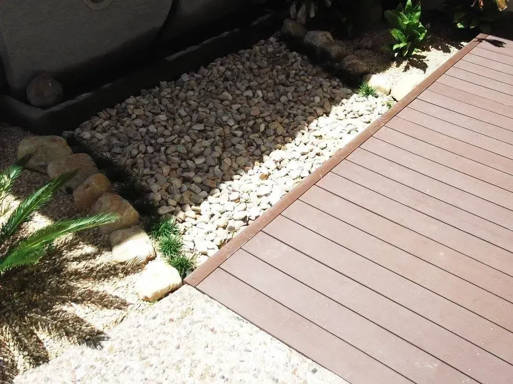 Exposed aggregate concrete around a Cairns pool