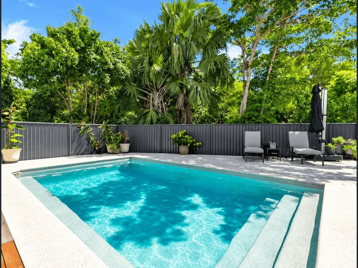 Concrete pool surround installation in Cairns