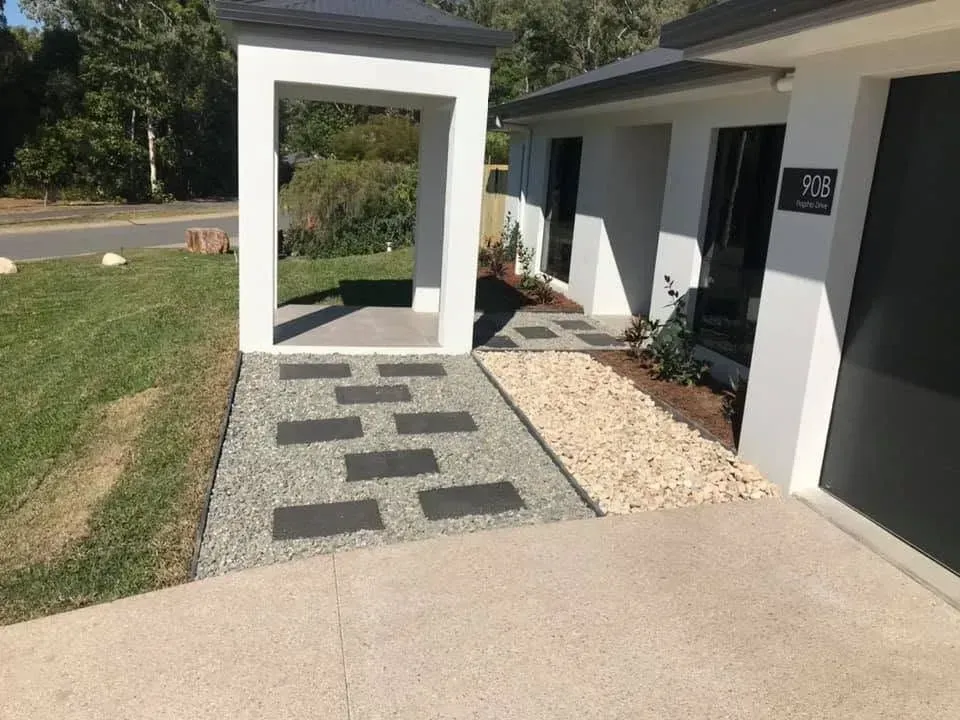 Exposed aggregate concrete around a Cairns pool