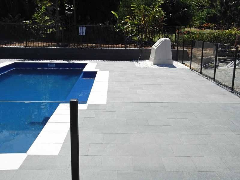 Concrete pool surround installation in Cairns