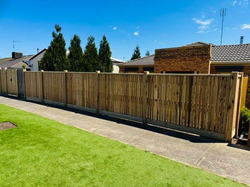 New besser block front fence with custom aluminium screens and gates installed