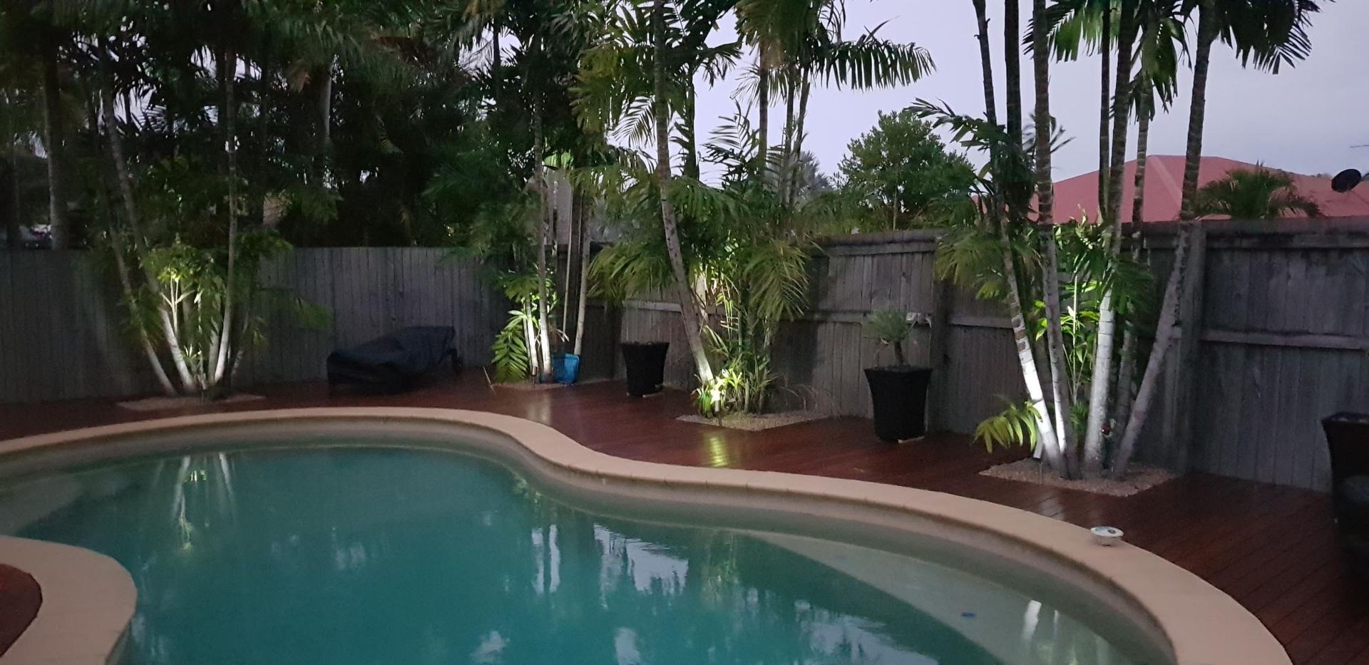 Decking with Kwila decking boards and feature lighting installed to pool area
