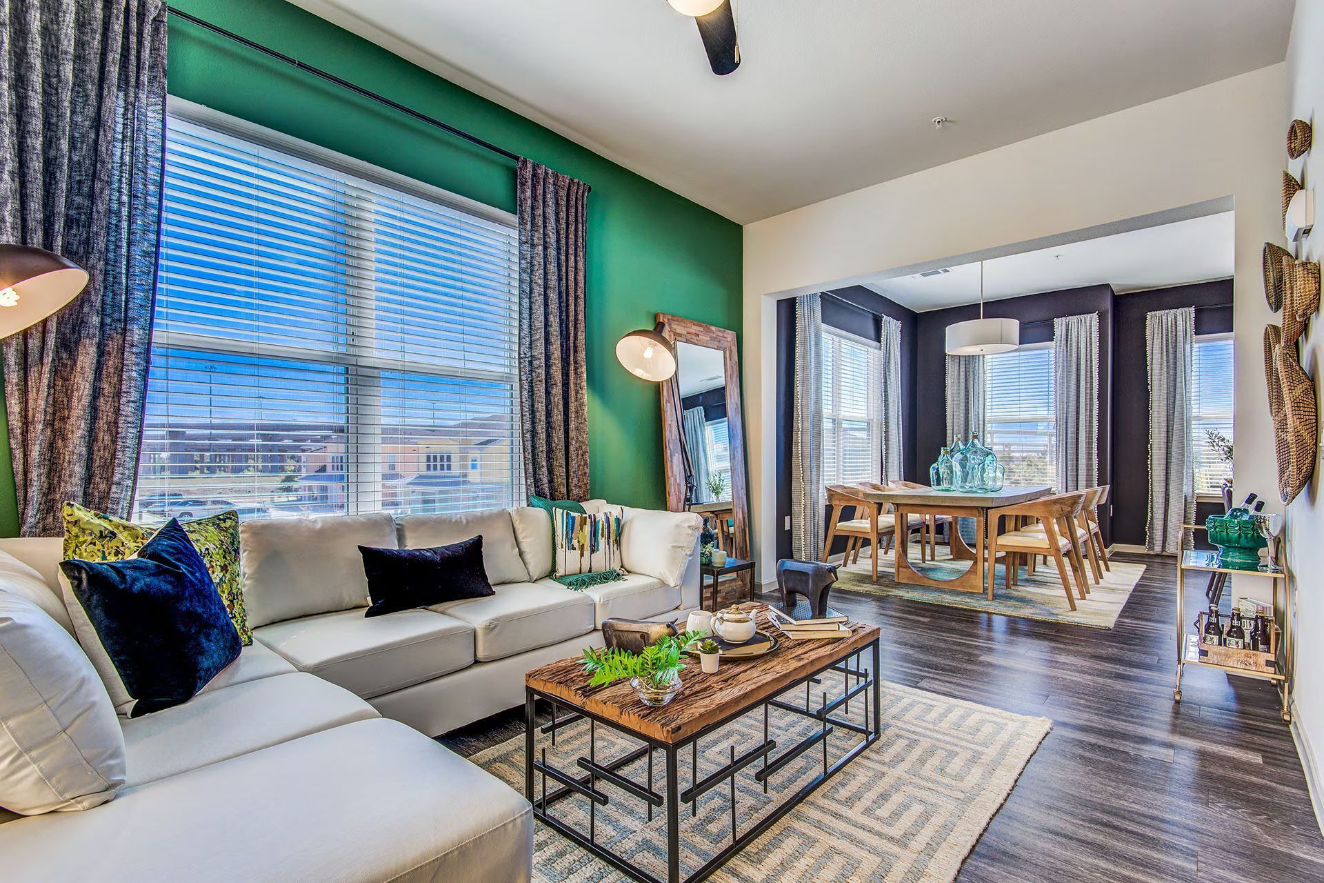 A living room with a lot of furniture and a television