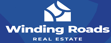 The winding roads real estate logo is on a blue background.