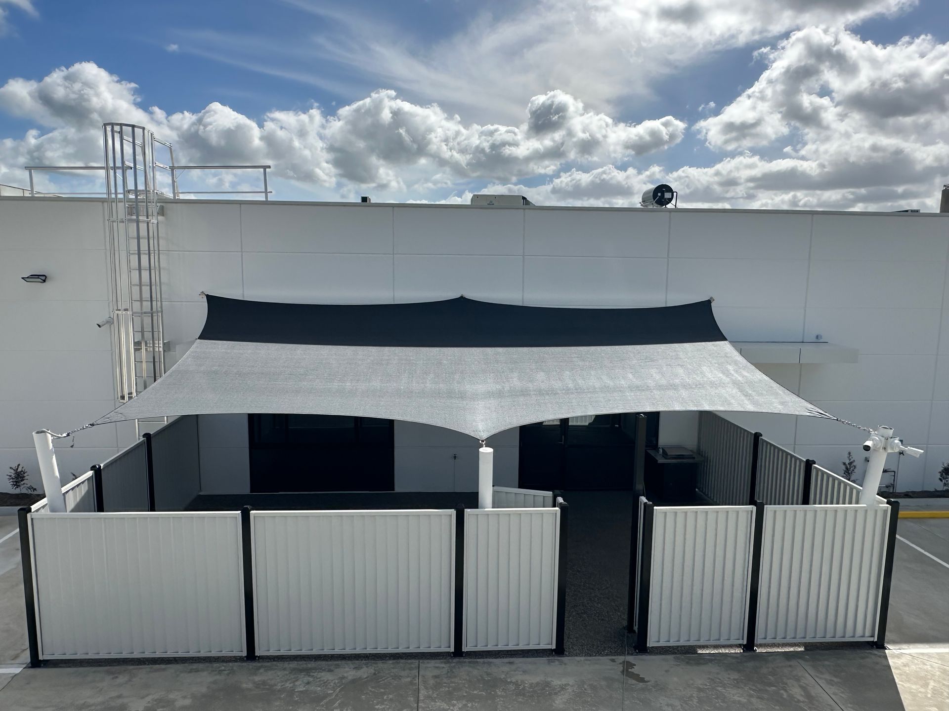 Shade sail installation over the staff area at the rear of the VicRoads Pakenham facility, delivering durable UV‑protective coverage and a high‑quality commercial shade structure for Melbourne’s South East workplaces