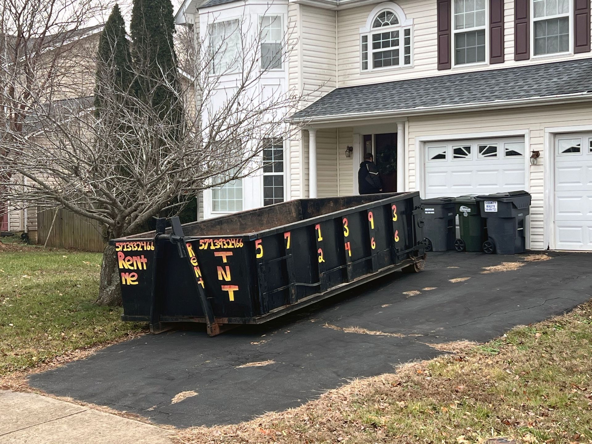 Flat-rate dumpster rental for garage cleanout in Stafford, Virginia