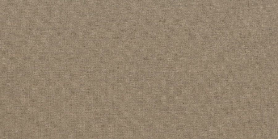 A close up of a beige fabric texture.