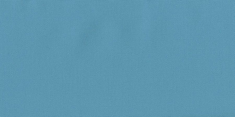 A close up of a blue fabric with a pattern on it.