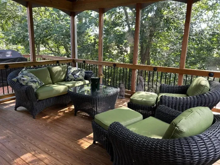 Lake Adela Patio Set with a loveseat, lounge chairs, and matching ottomans and tables