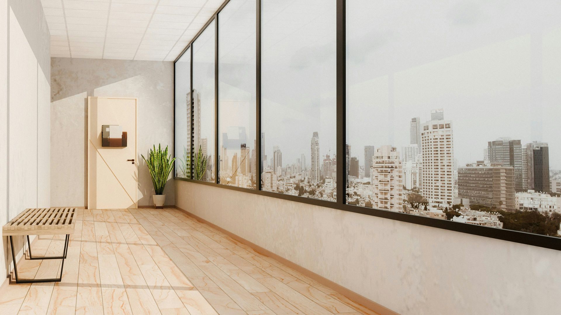 Long hallway with city view through large windows, wooden floor, bench, and plant.