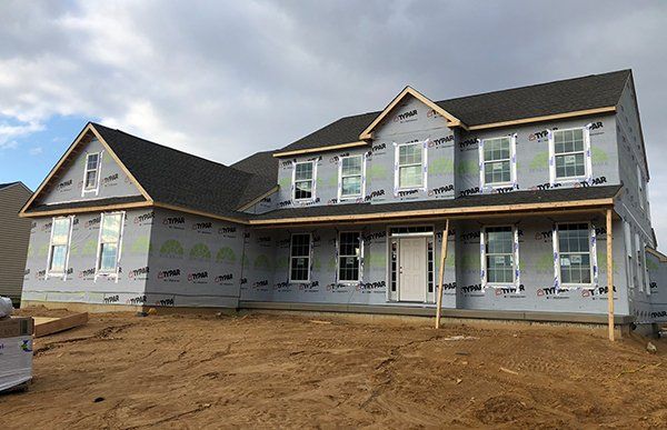 House Siding Under Construction — Millsboro, DE — Alpha Roofing & Siding