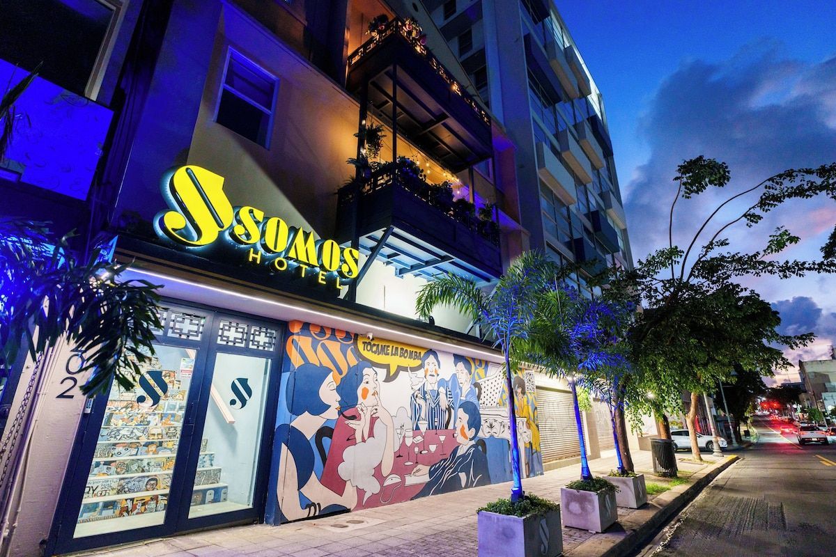 A large building with a mural on the side of it.