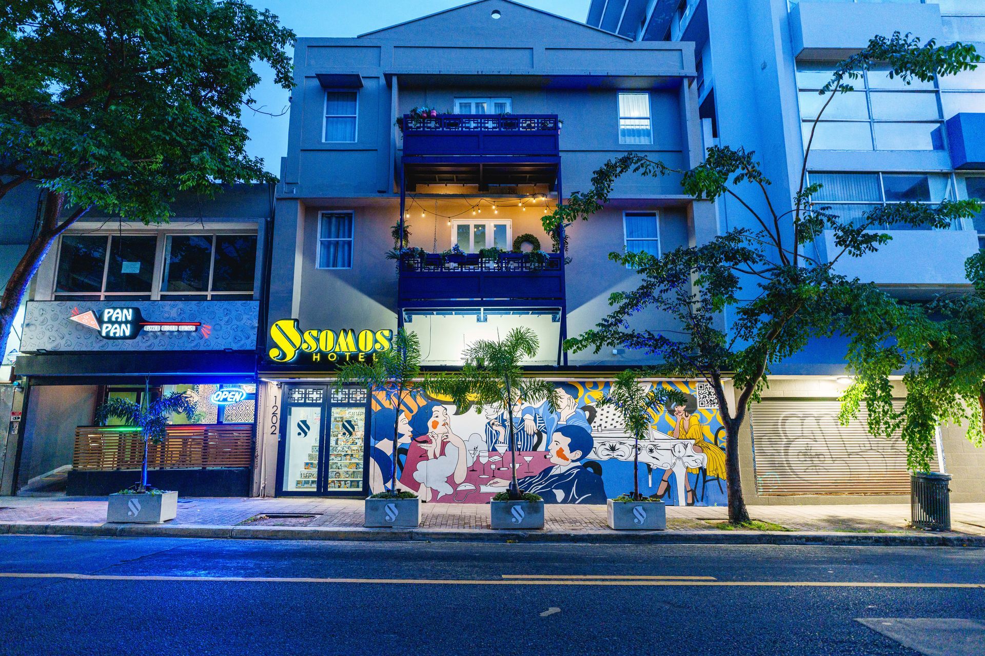 A building with a graffiti mural on the side of it