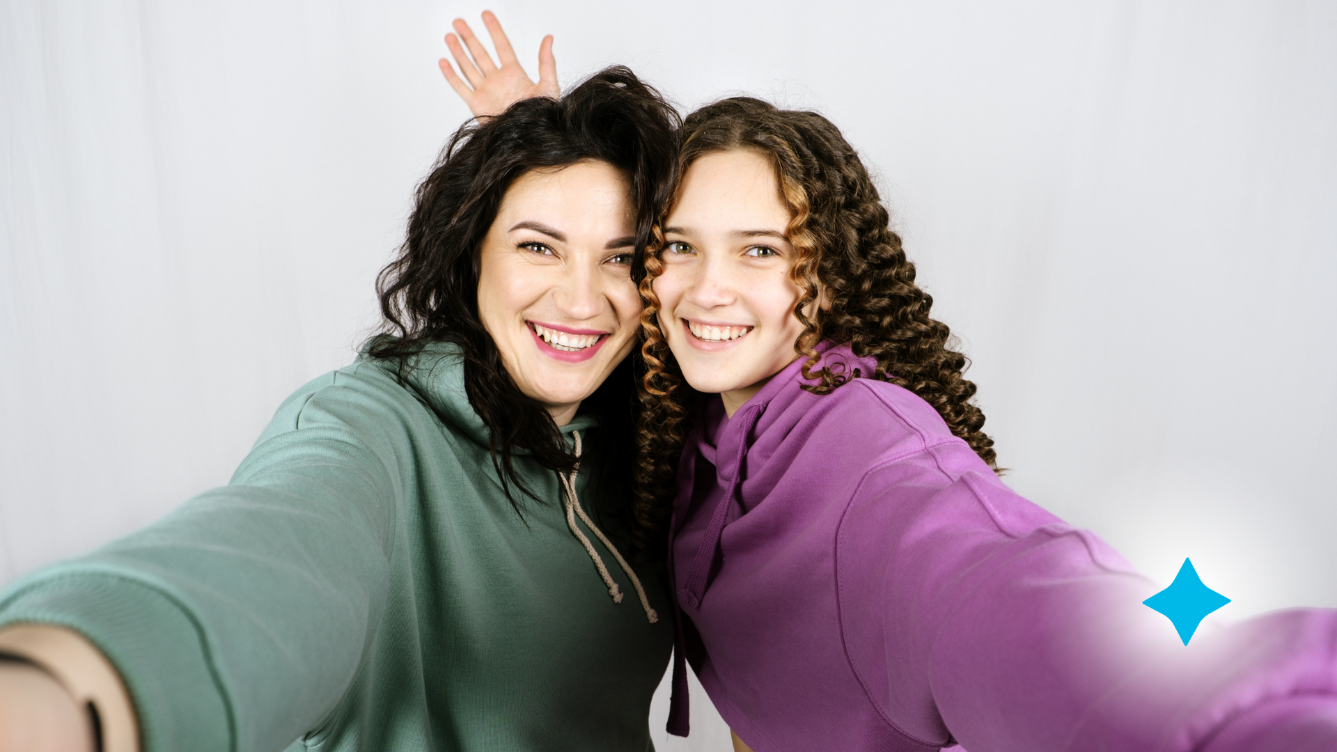 Two young women are taking a selfie together.