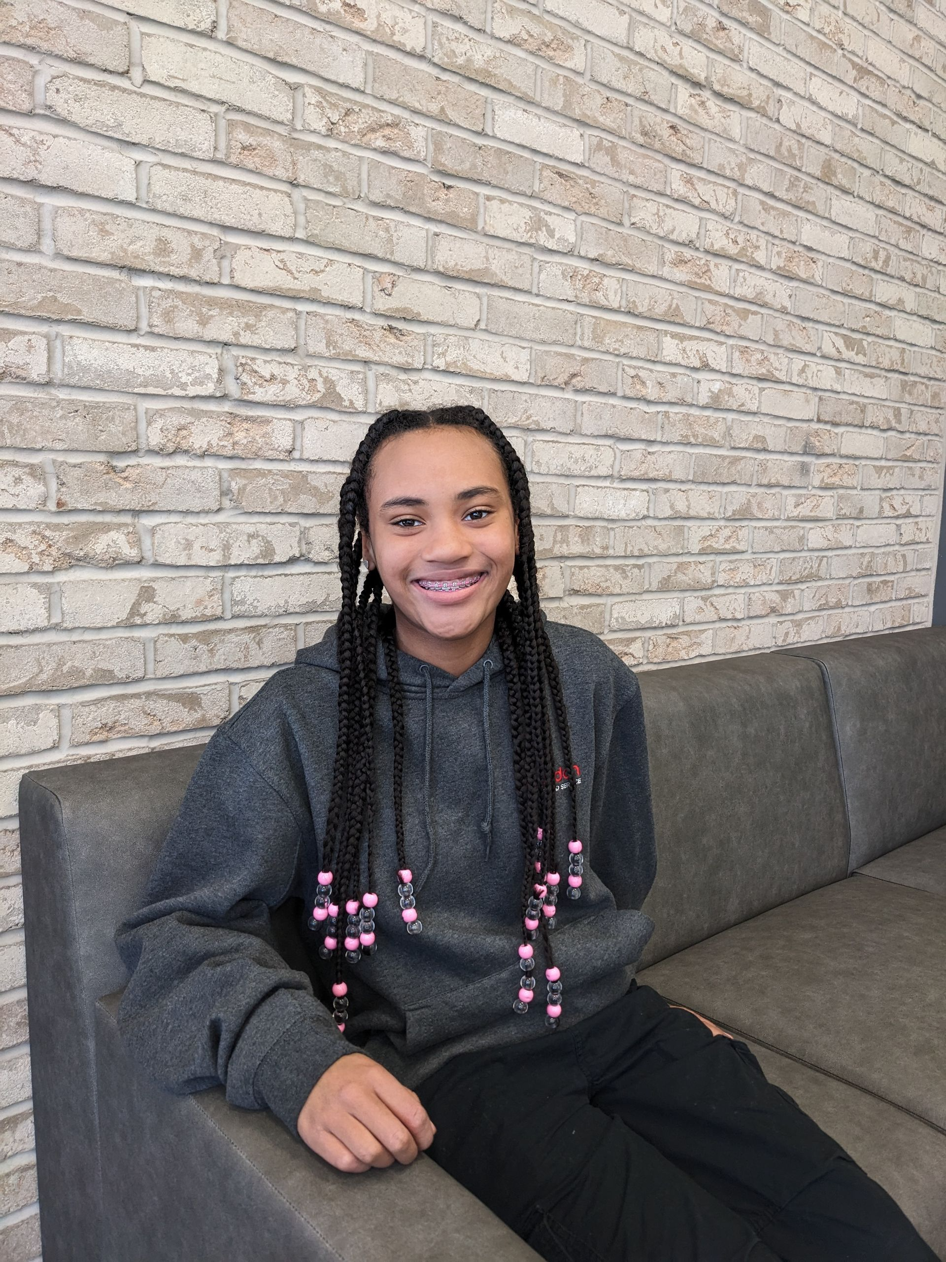 happy metal braces patient at smileright