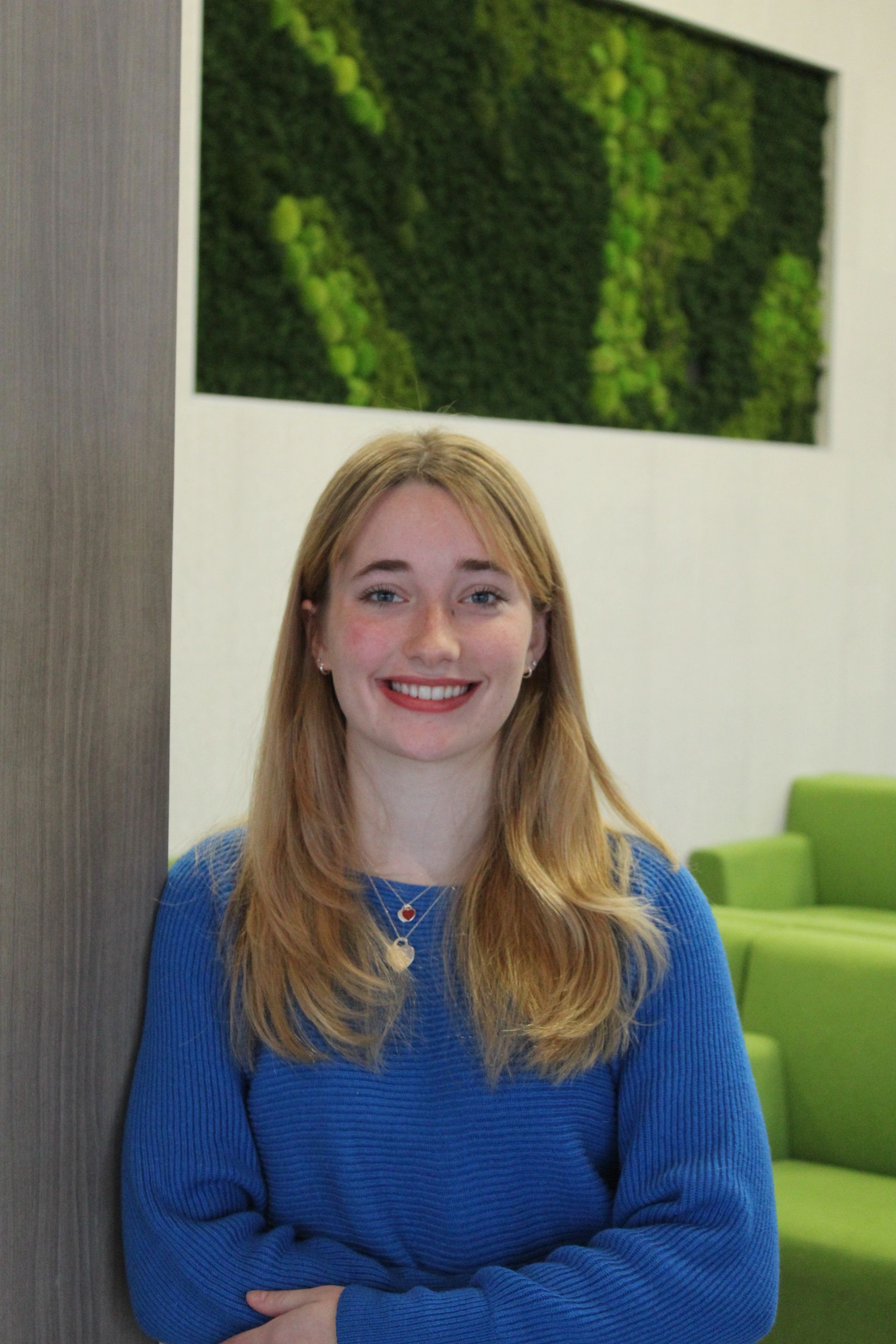 girl smiling after getting braces removed