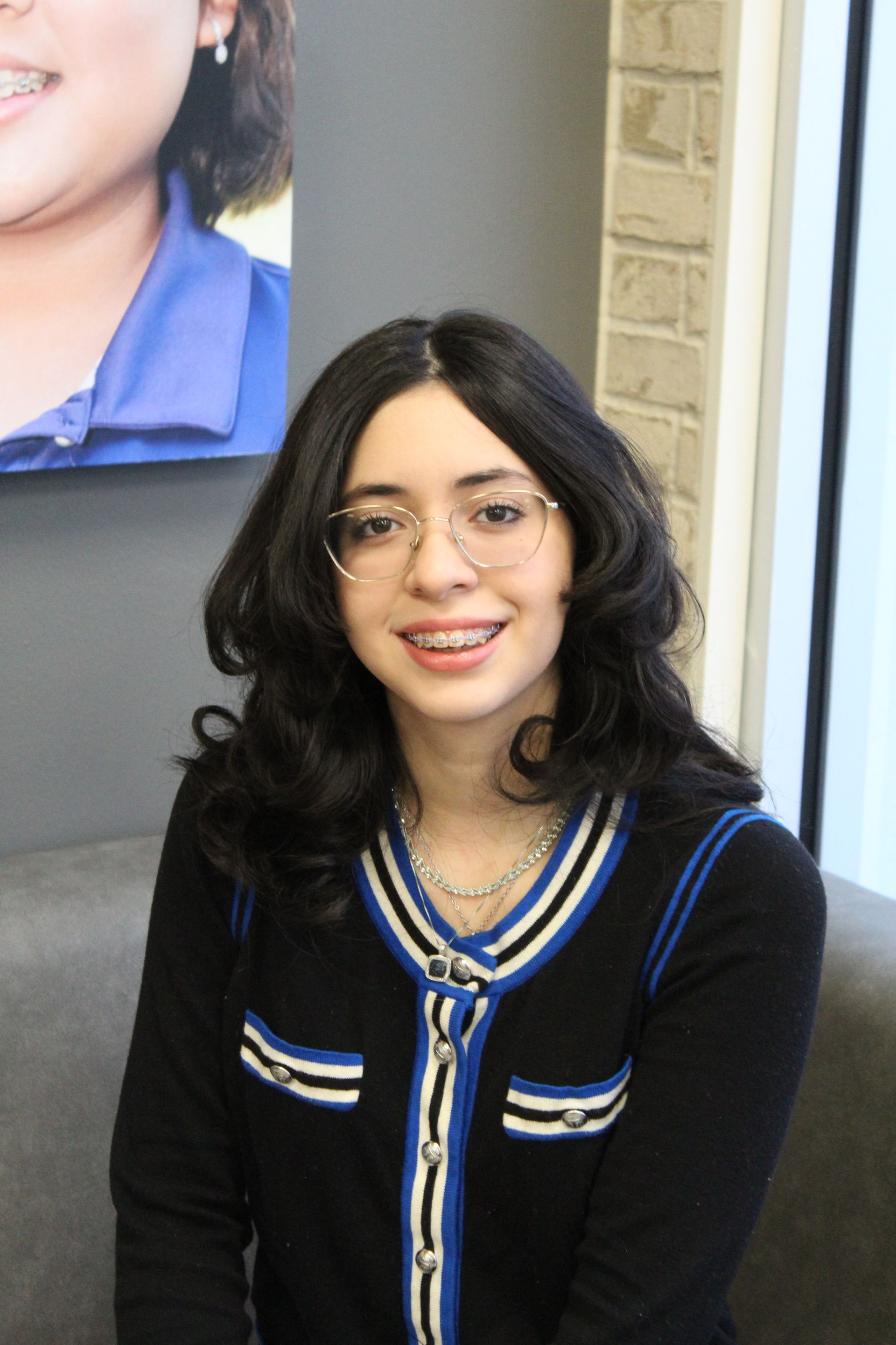 girl smiling with braces on