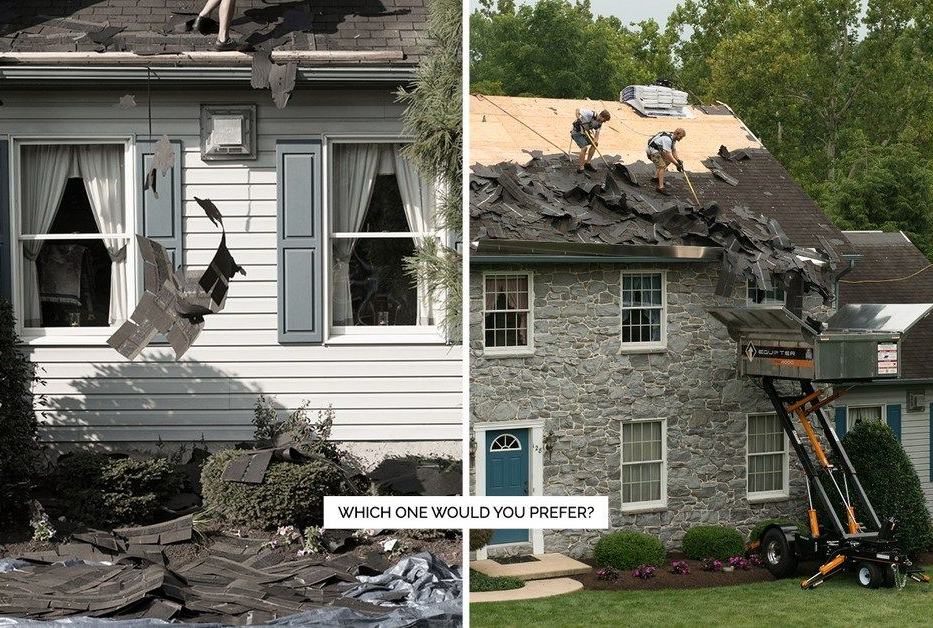 Two-story house roof damaged by fallen tree; workers on roof beside an excavator clearing debris.