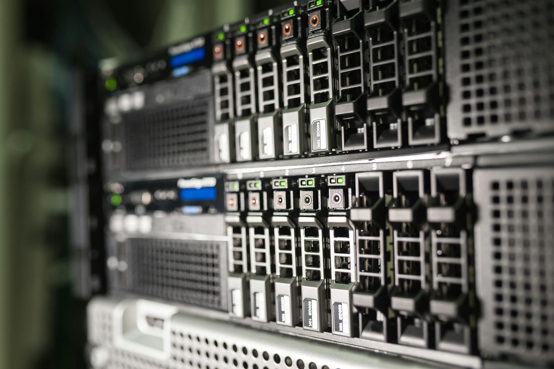 Close-up of server racks with glowing status lights in a data center