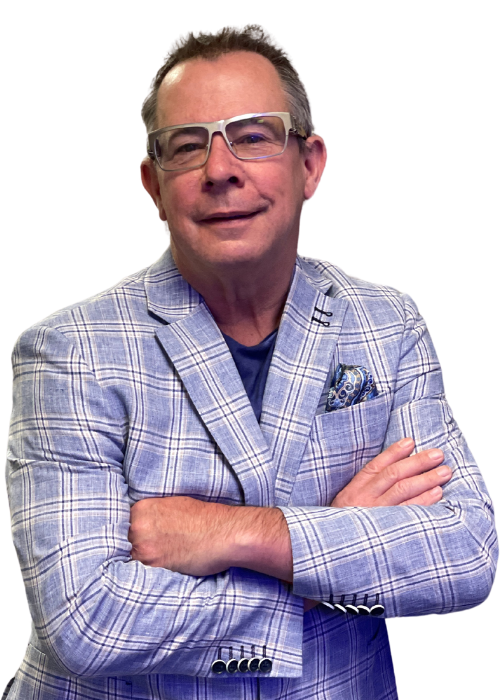 Man with crossed arms, wearing glasses, blue plaid blazer, and blue shirt.