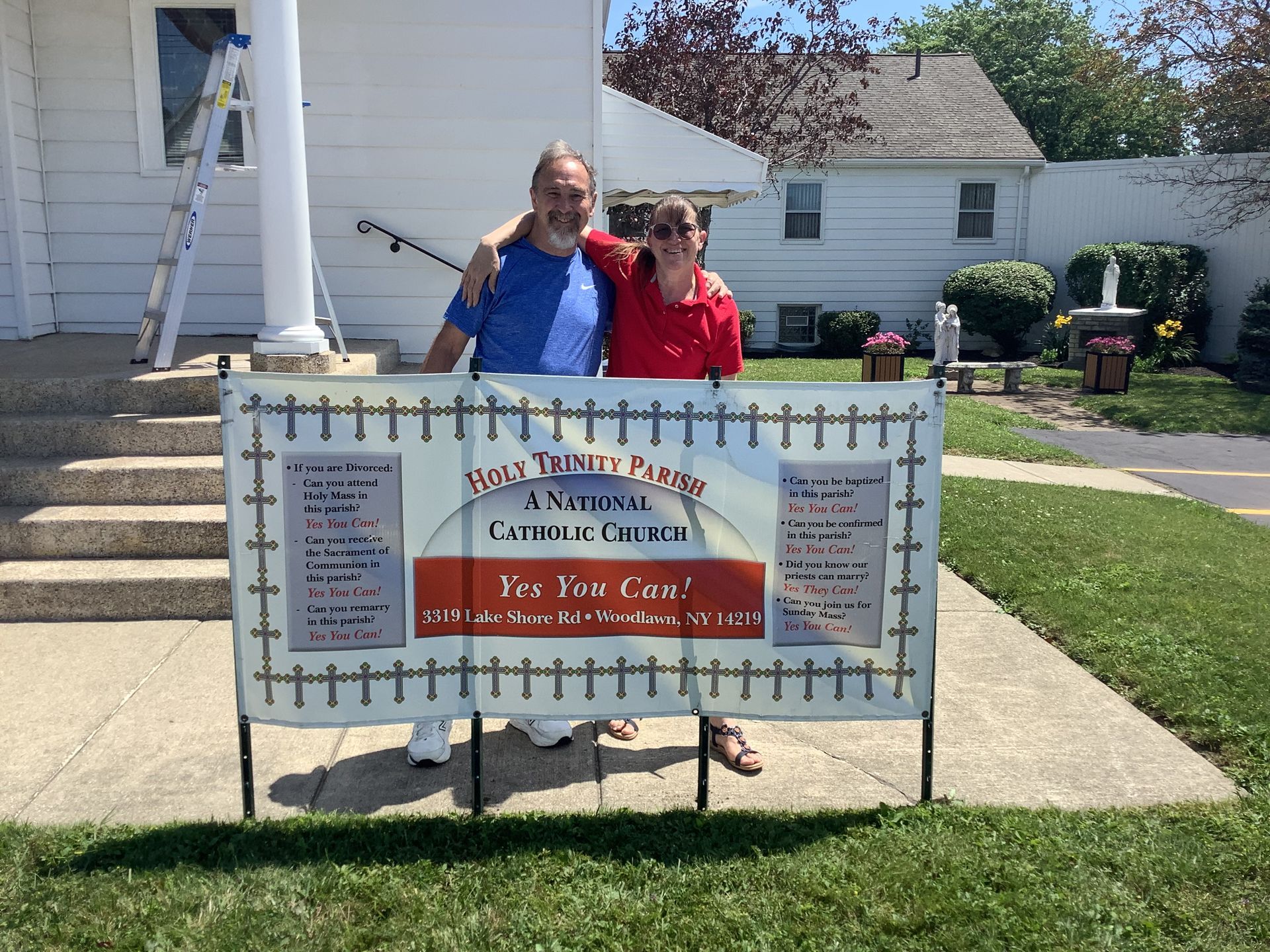 A man and woman are standing in front of a sign that says i 'm cool