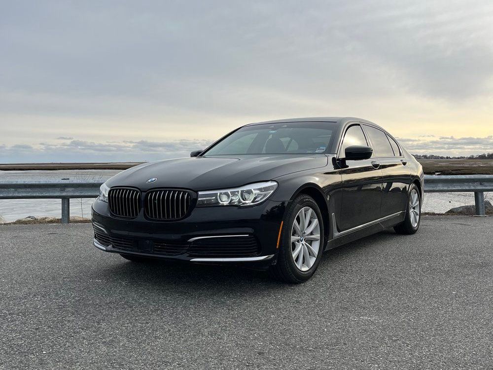 Luxury black car silhouette - premium transportation service