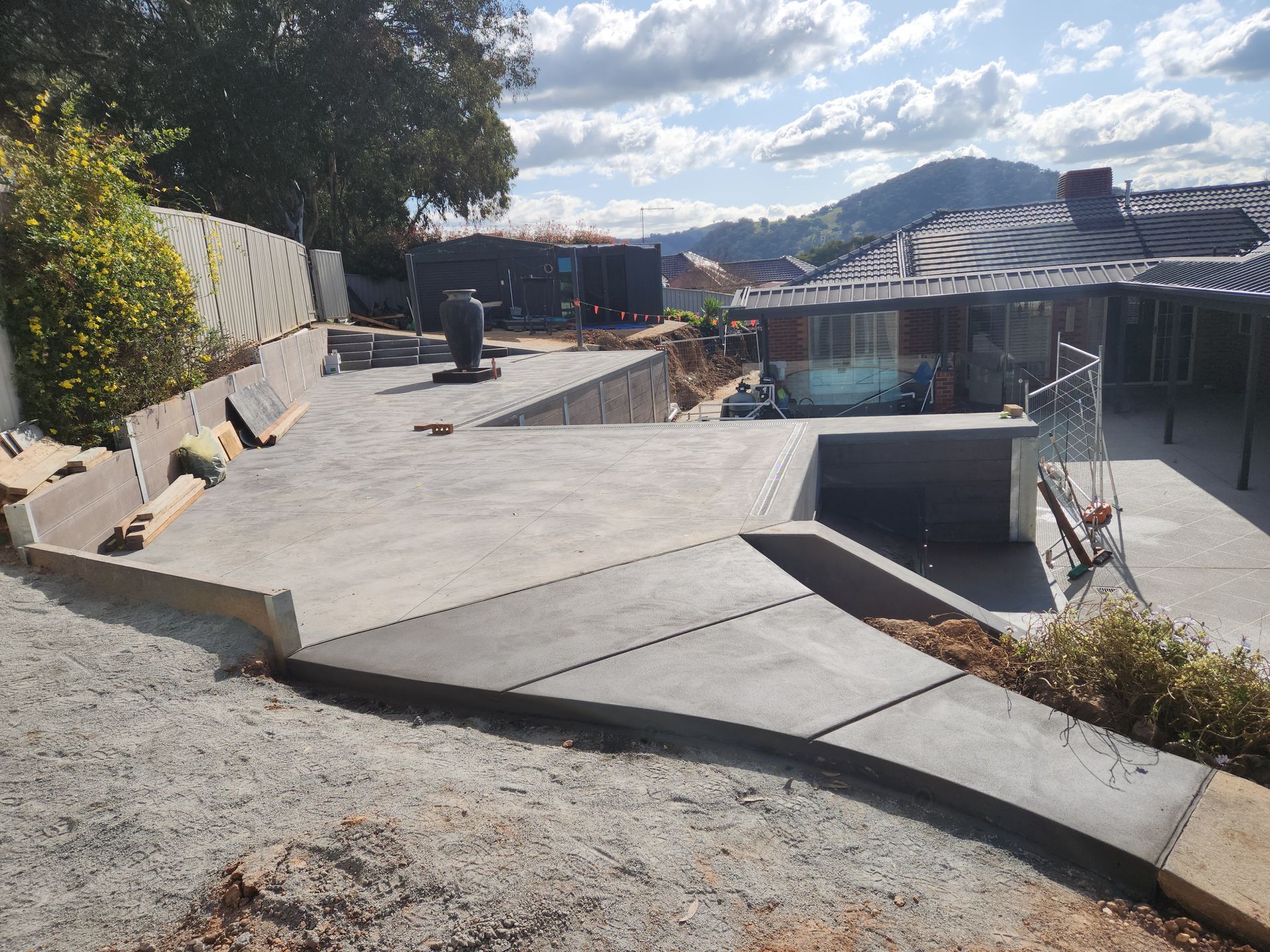 Concrete slab near pool and raised-Colombera Constructions In Wodonga, VIC