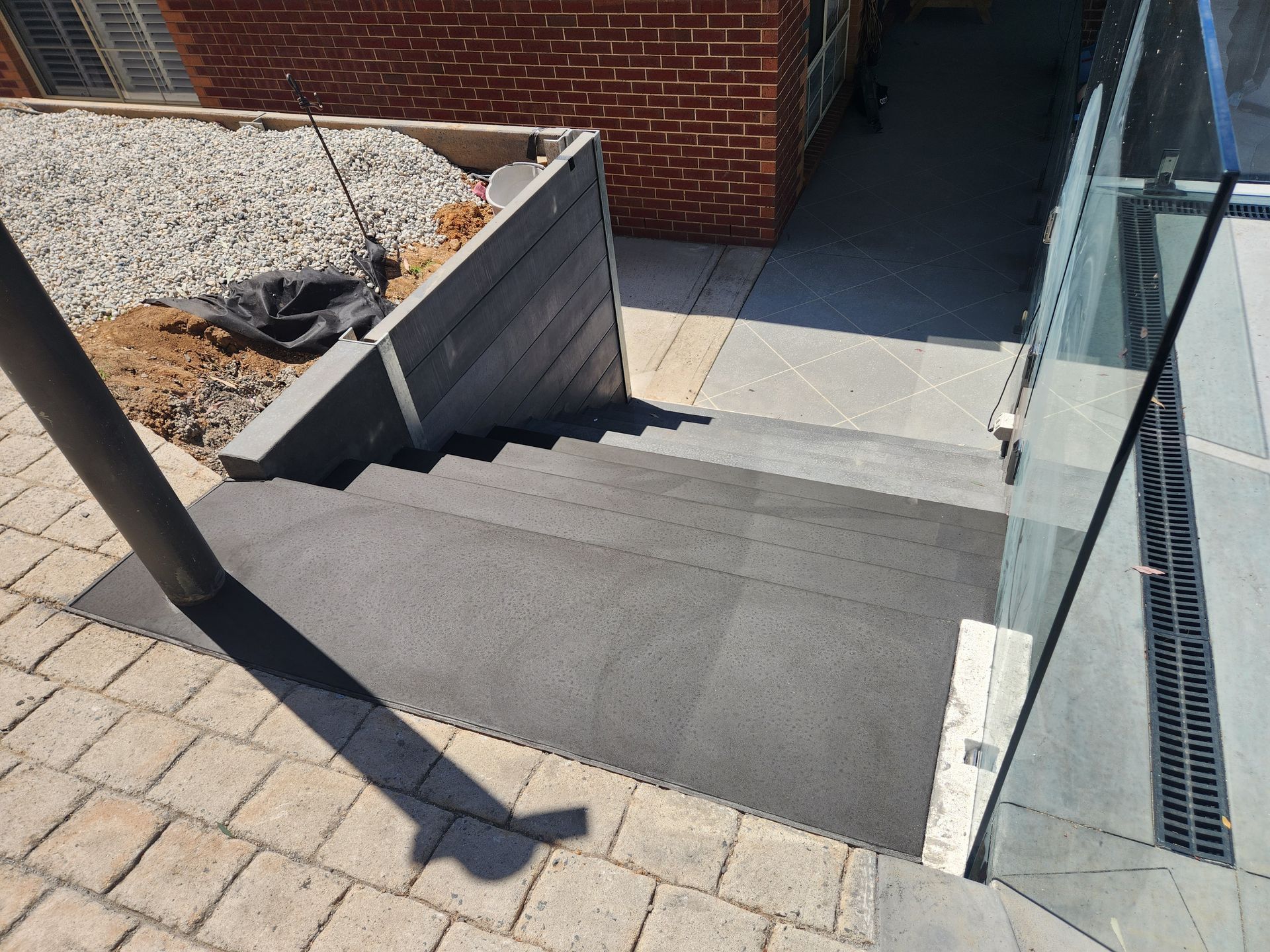 top of concrete stairs next to pool fence -Colombera Constructions In Wodonga, VIC