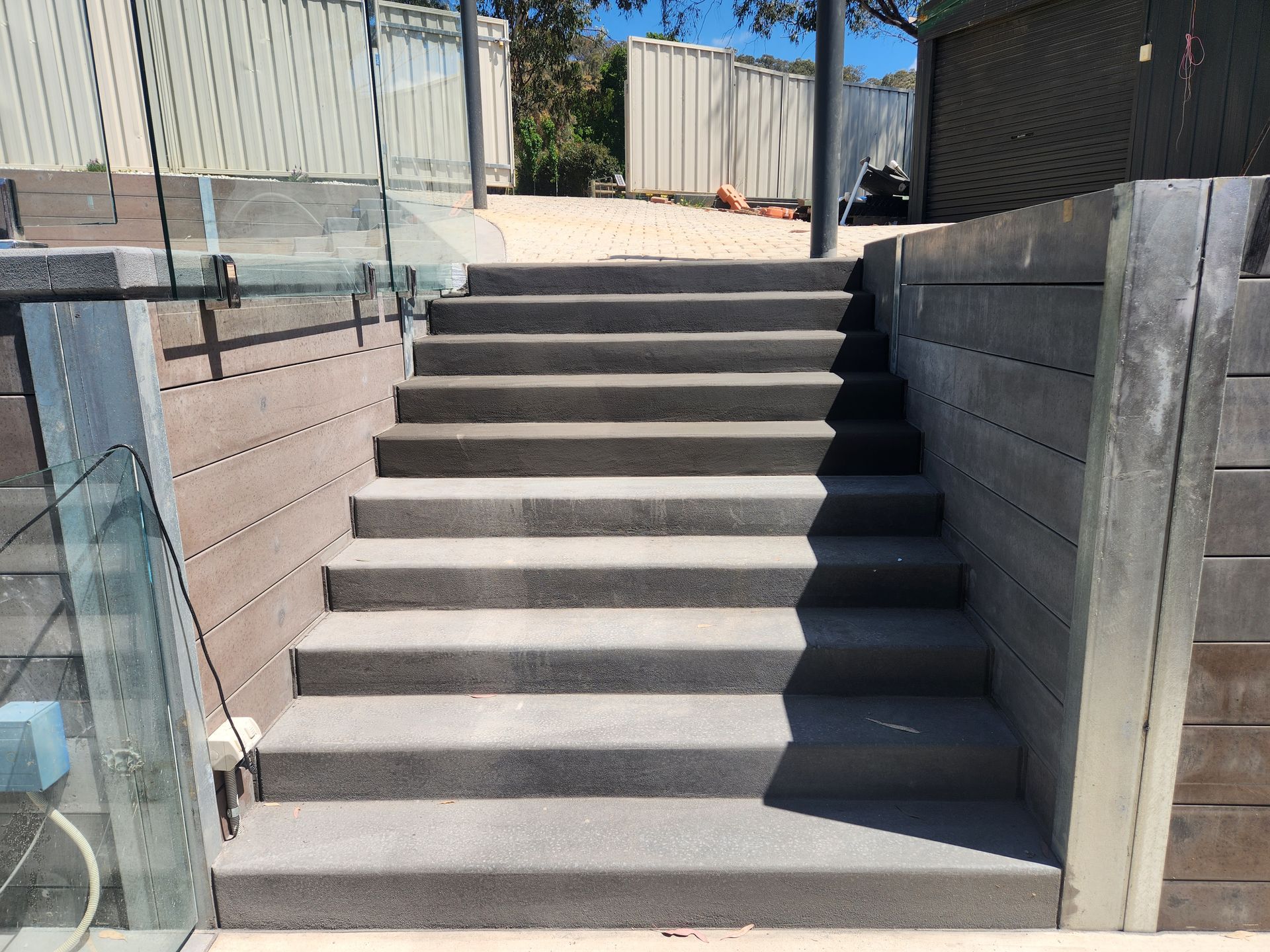Concrete steps with a retaining wall -Colombera Constructions In Wodonga, VIC