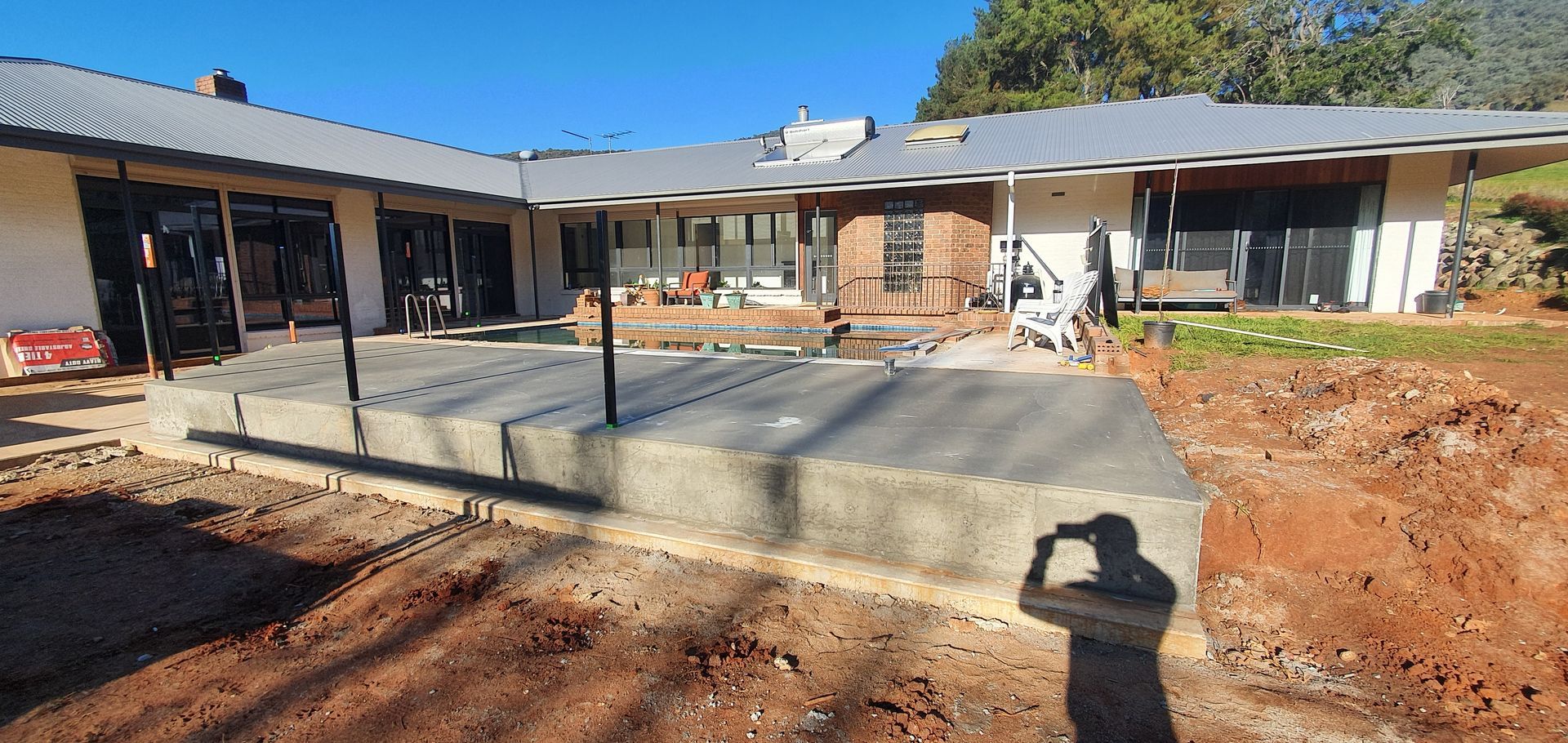 newly poured concrete slab ready for alterations to the house — Colombera Constructions In Wodonga, VIC