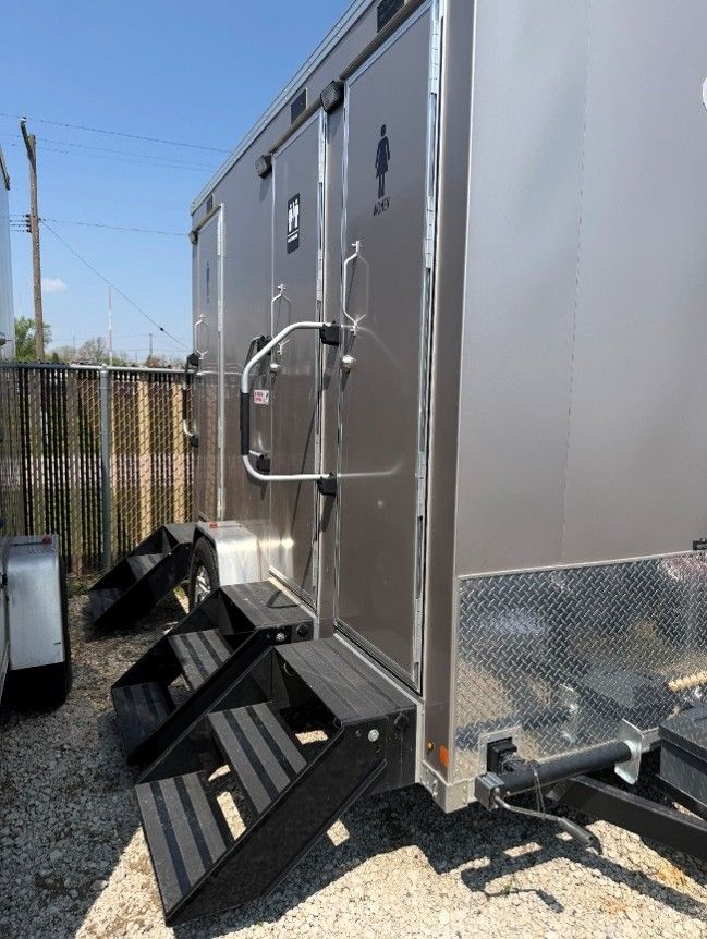 Emergency portable restroom trailer deployed on-site in Detroit, MI, by Scotty's Potties.