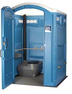 Interior of a blue portable toilet, showing the toilet bowl, sink, and walls.