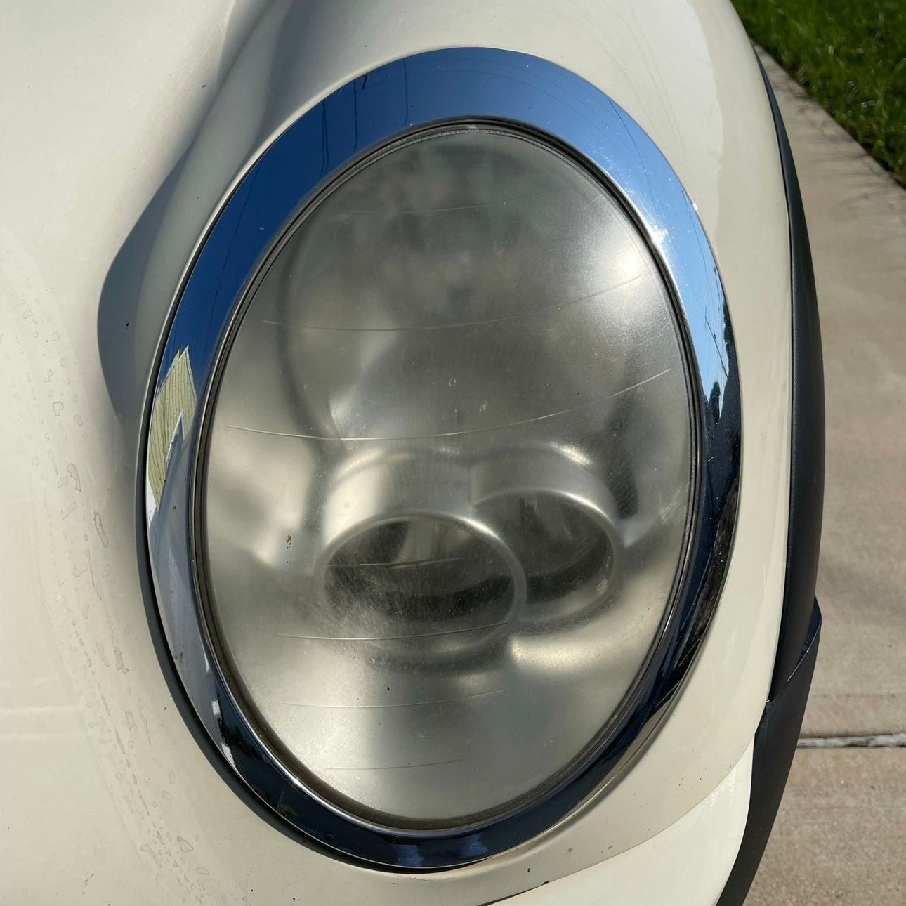 BEFORE HEADLIGHT RESTORATION