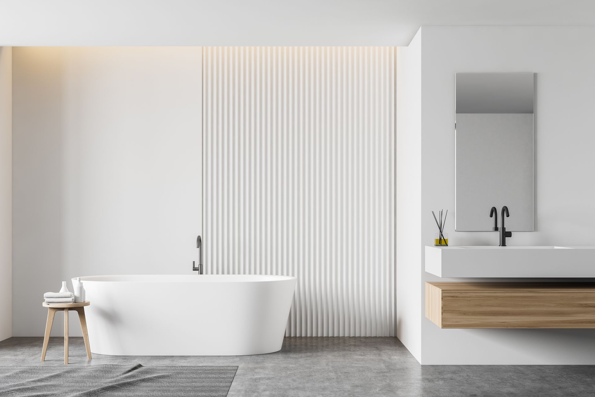 Modern white bathroom with freestanding tub, wooden vanity, and textured wall panel.