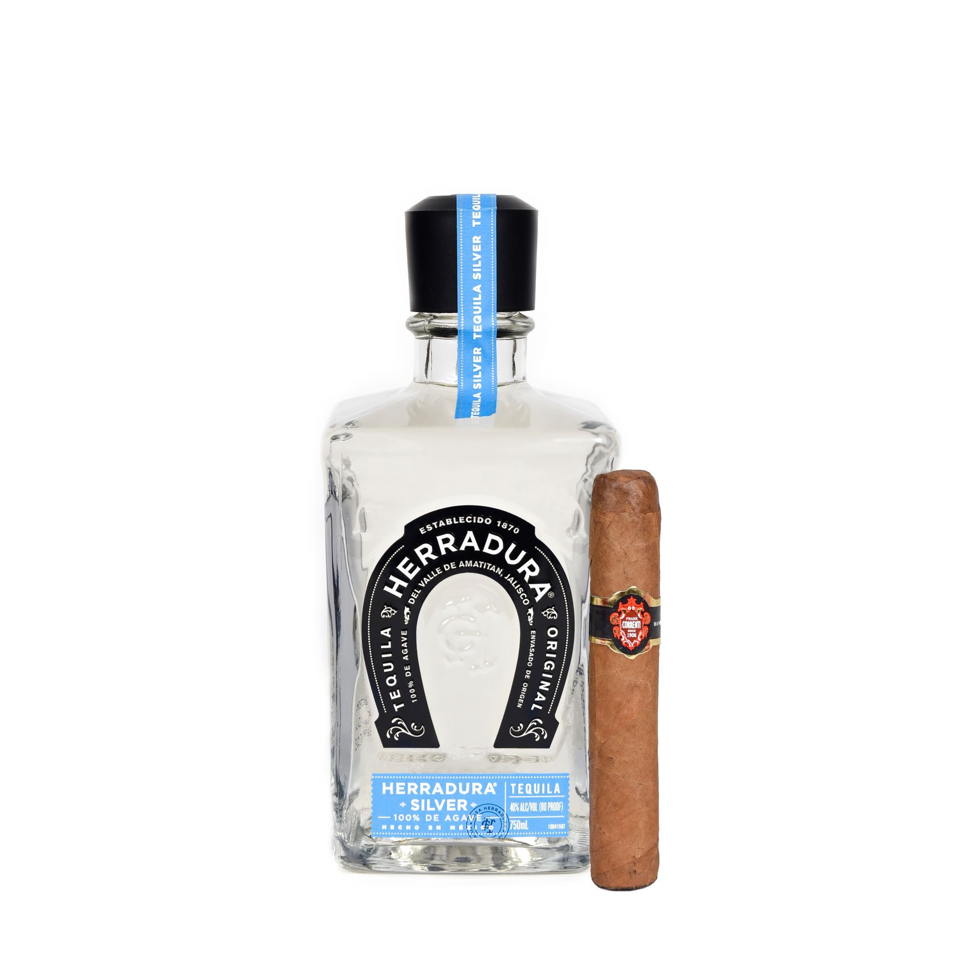 Bottle of Herradura tequila with a cigar.