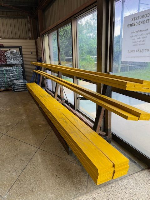 A Bunch of Steel Reinforcing Accessories in Front of A Window - Concrete Options Group in Gympie, QLD