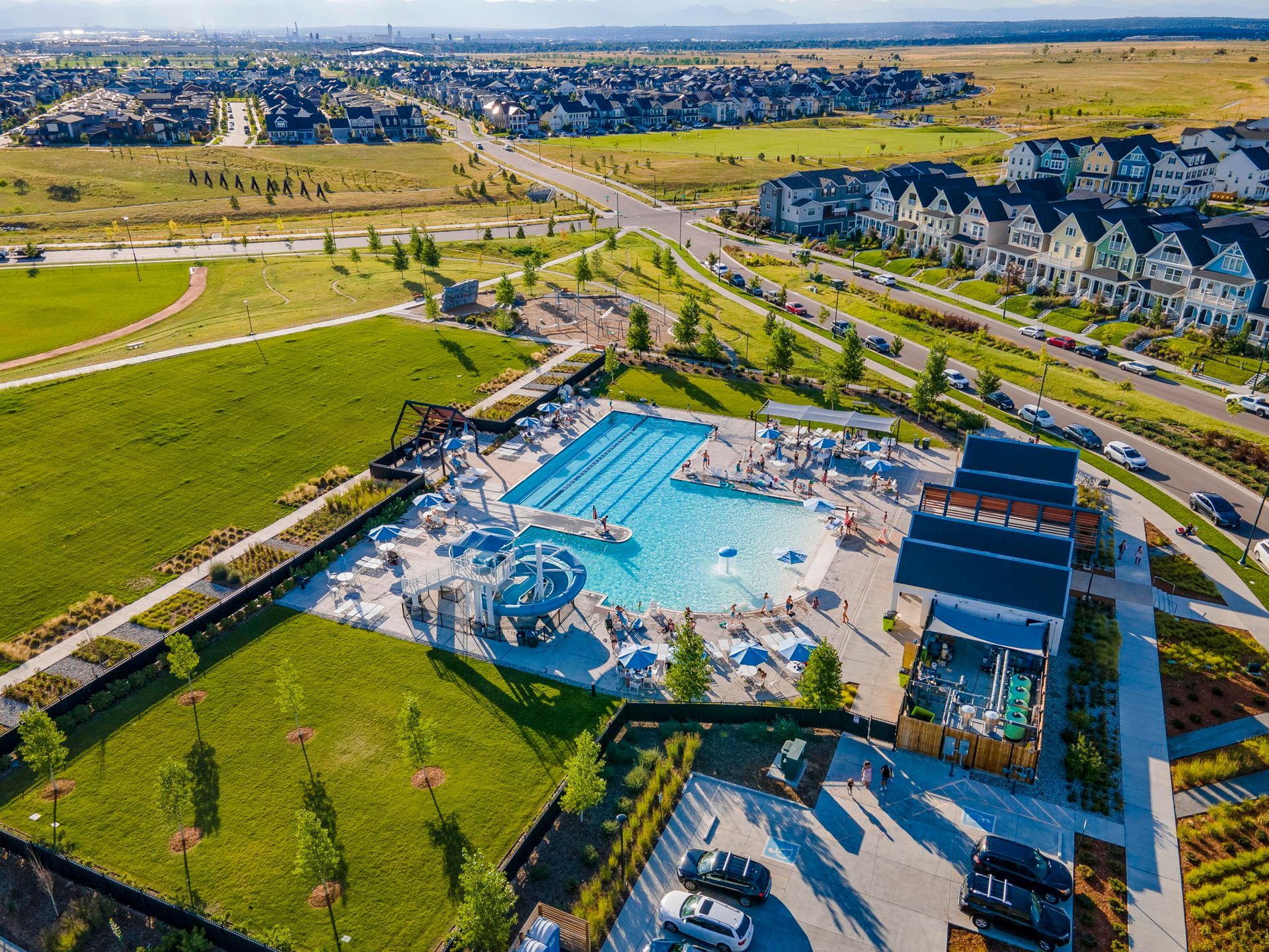An aerial view of a large swimming pool in a residential area in Central Park Colorado. 