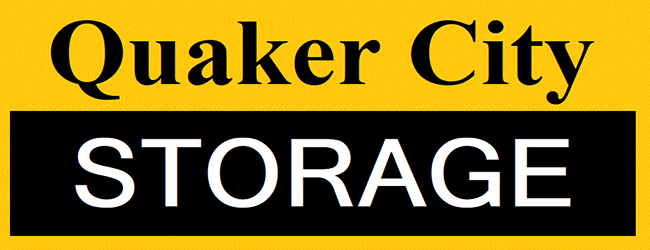 Logo for Quaker City Storage with the text in black and white against a yellow background.