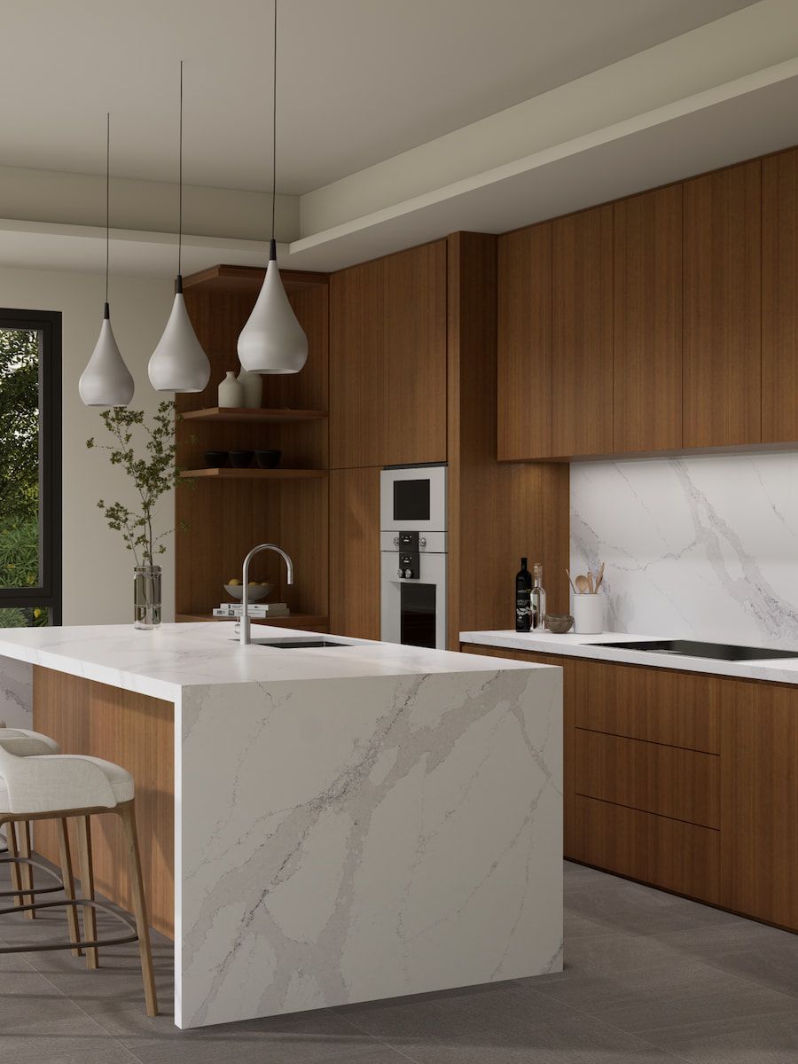 A Kitchen With a Large Island and Wooden Cabinets — Better Stone in Caloundra West, QLD