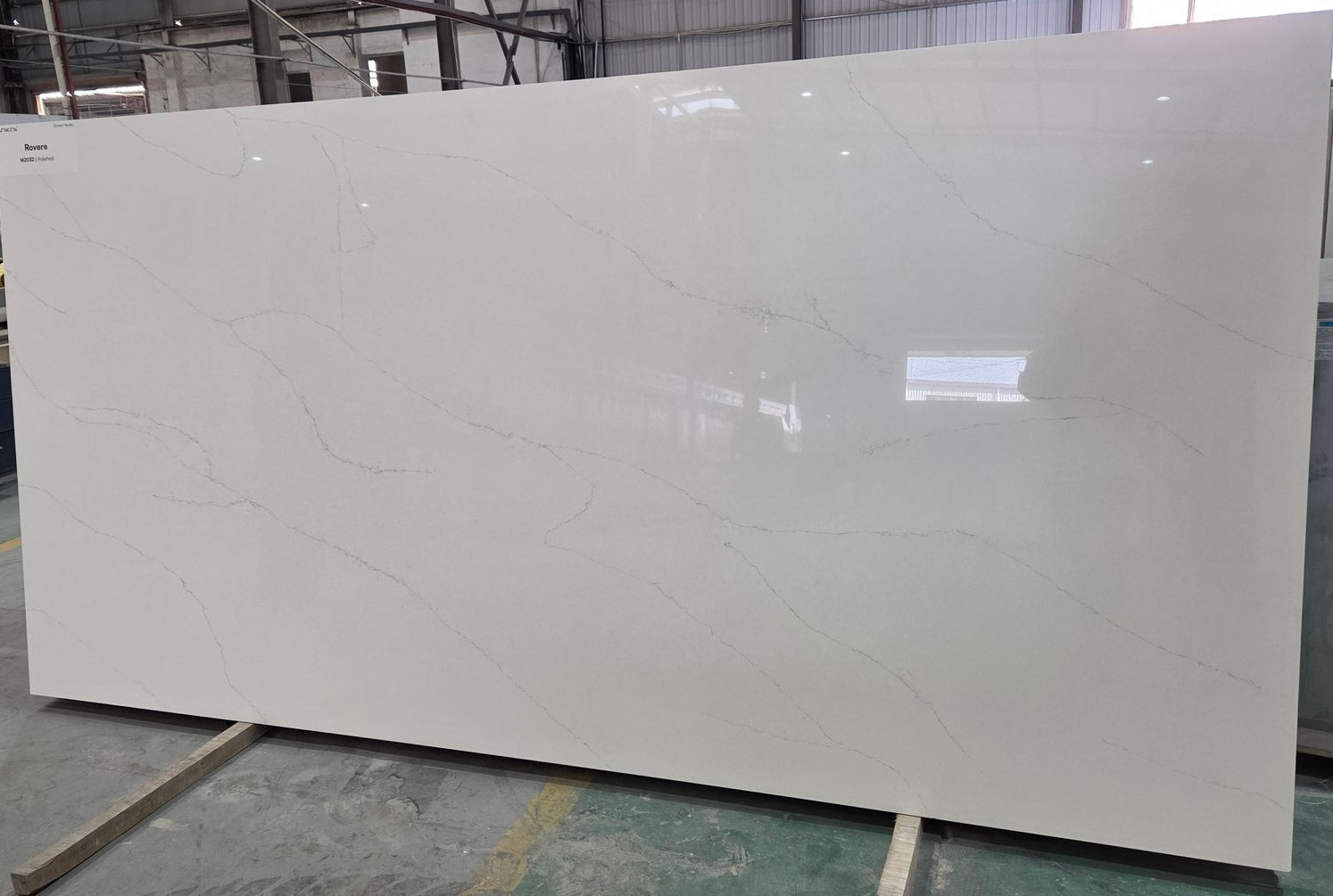 Large White Quartz Slab With Subtle, Light Grey Veining, Shown Standing — Better Stone in Caloundra West, QLD